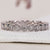 Elegant Milgrain Wedding Band with intricate details for a timeless look.
