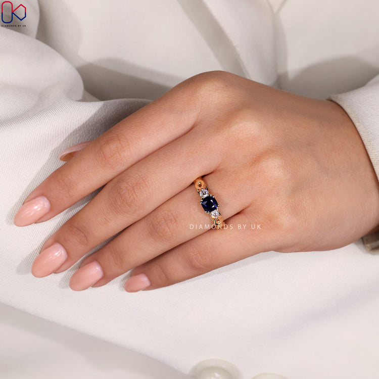 Double prong setting blue sapphire engagement ring.
