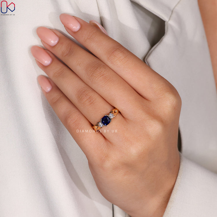 Handmade yellow gold blue sapphire engagement ring.
