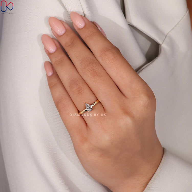 Yellow gold lab diamond solitaire ring

