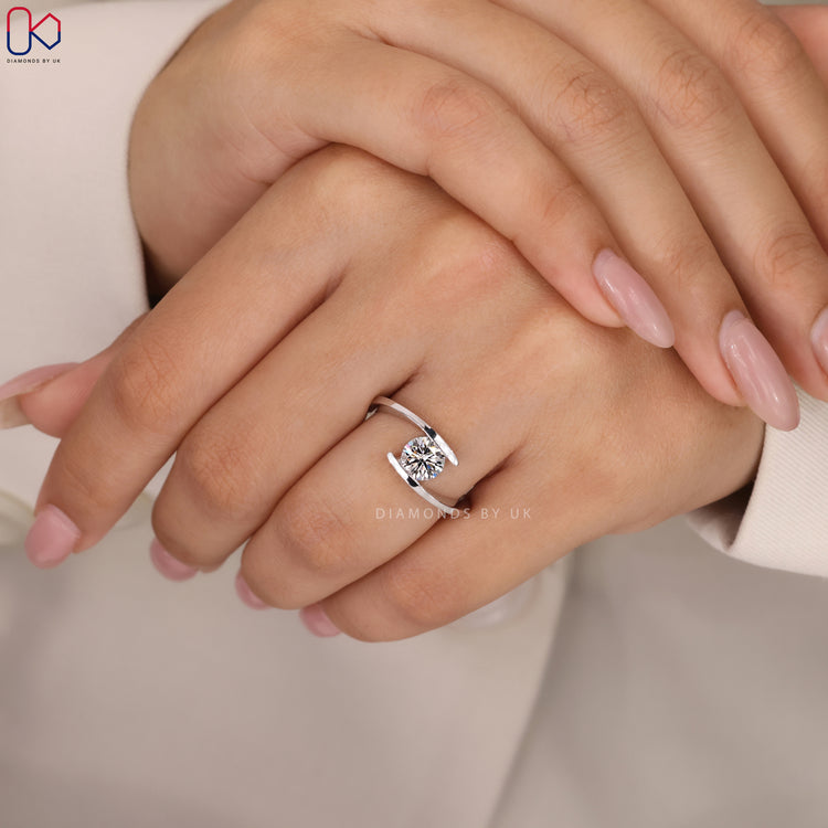 Handmade bypass setting diamond engagement ring.
