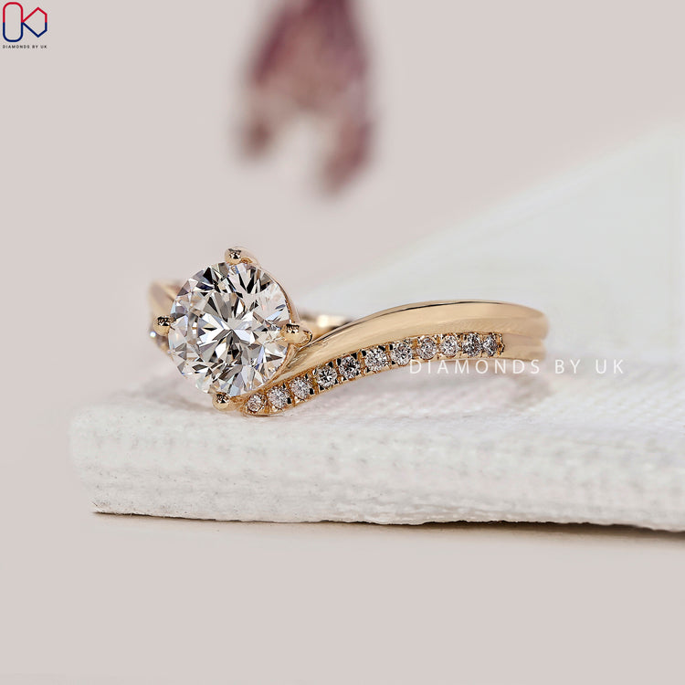 Yellow gold diamond ring with a stunning pave design.
