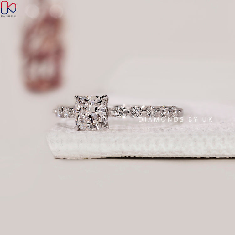 Customize ring with lab grown diamonds in a white gold shared prong layout.