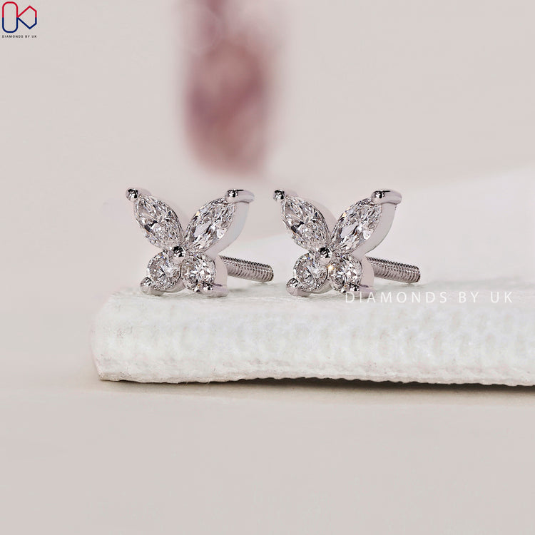 White Gold Stud Earrings adding a touch of sophistication.
