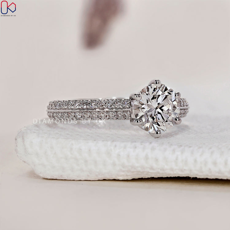 Elegant white gold diamond ring with a beautiful round cut diamond ring.