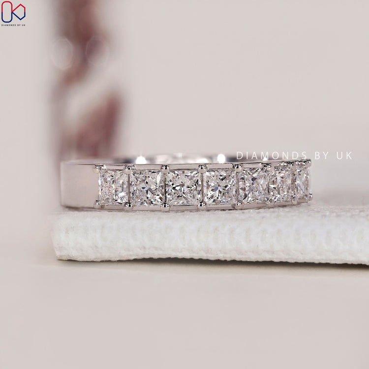 IGI certified princess cut eternity band ensuring top-notch quality.
