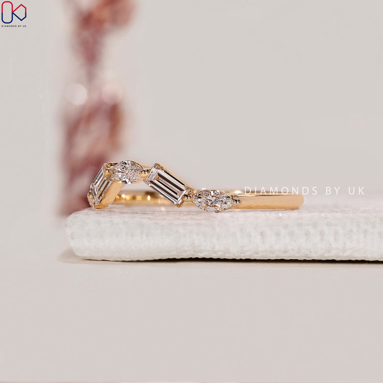 Buy wedding band made as a shared prong wedding band.
