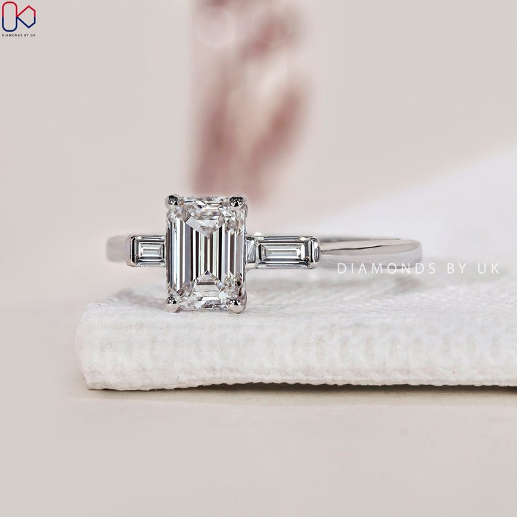 White gold ring with a classic prong setting ring design.
