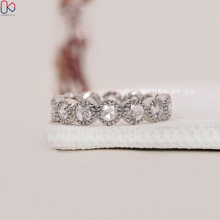 Buy diamond band with full round stone design.
