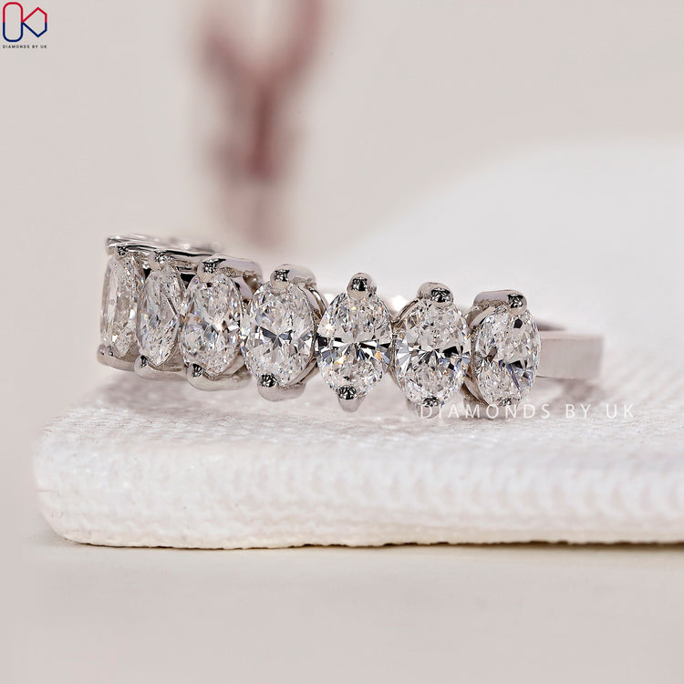 Classic white gold wedding band with a polished and sophisticated finish.