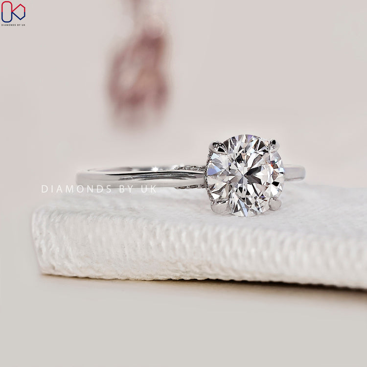 White gold diamond ring with a sleek and modern design.
