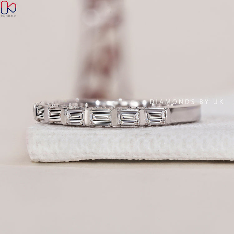 Bar set baguette wedding band offering clean lines and a refined look for any occasion.
