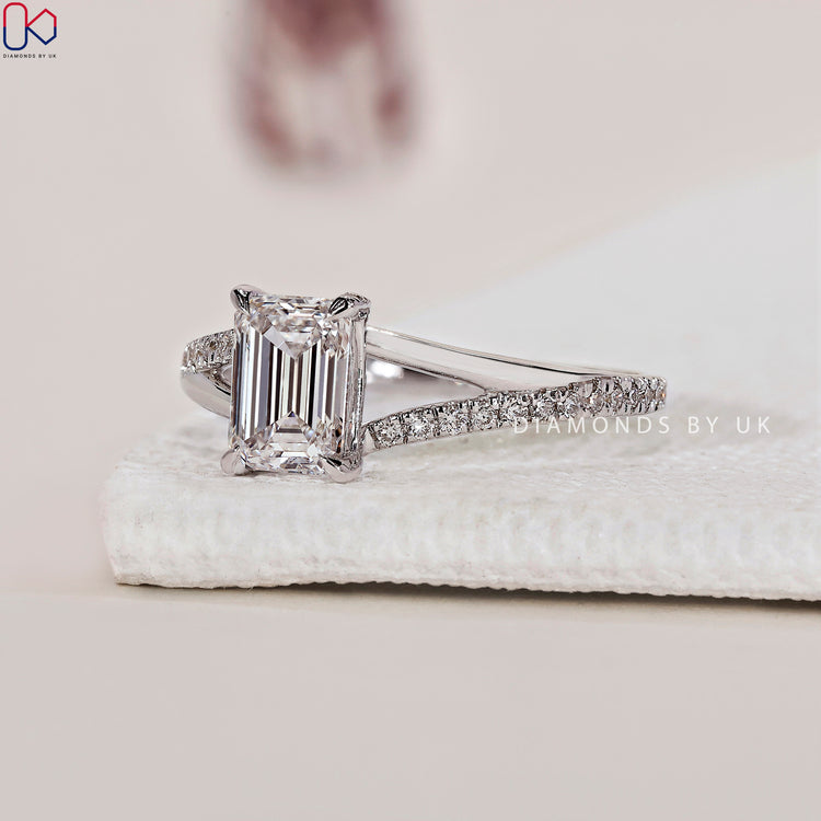 White gold engagement ring with a 4 prong claw setting.
