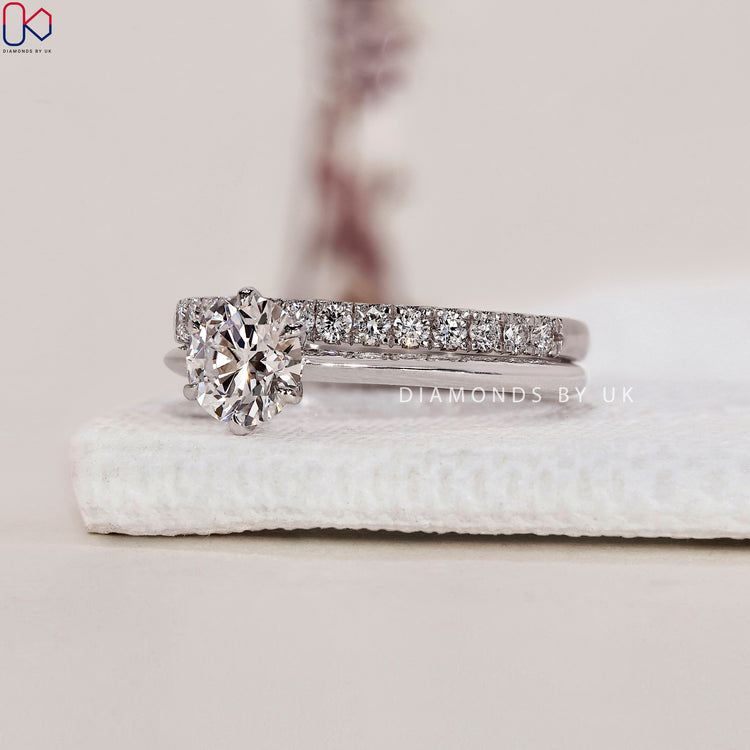 Half eternity wedding band with lab-grown diamonds for elegance.
