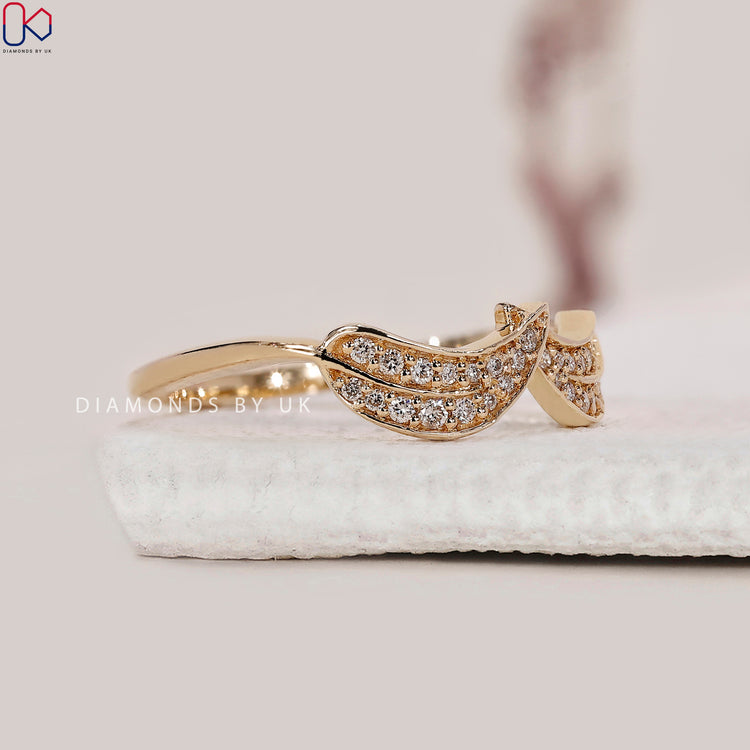 Yellow gold ring featuring a round diamond for a classic look.
