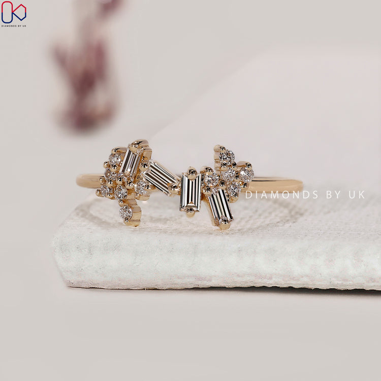 Unique engagement ring with cluster and mixed cuts.
