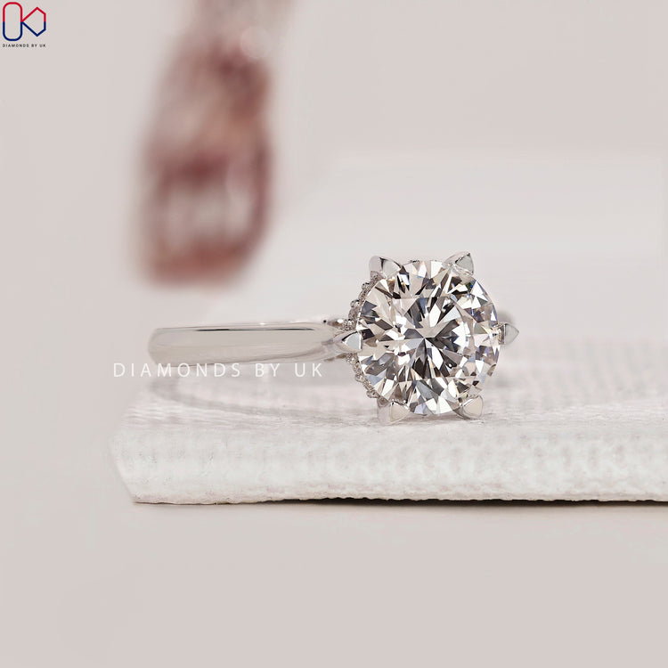 Cathedral setting ring with a classic design.

