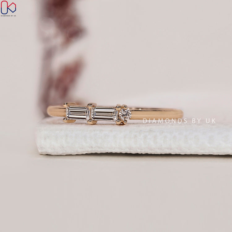 Morse code wedding band with unique engraving and diamond accents.
