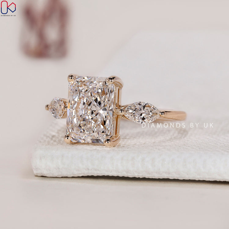 Yellow gold engagement ring with radiant sparkle.
