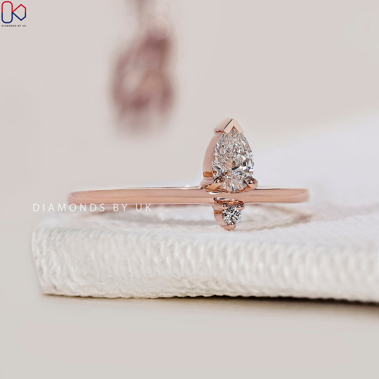 Customize wedding band with V prong setting for a unique look.
