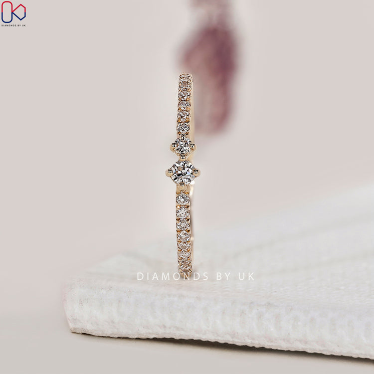 Yellow gold wedding band with half eternity design.
