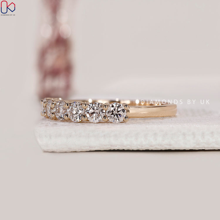 Buy wedding band with 7 stone wedding band.
