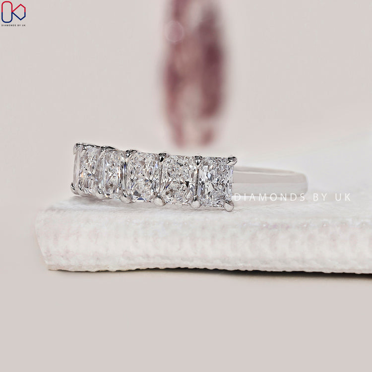 Buy diamond band in white gold with radiant cut lab grown diamonds.
