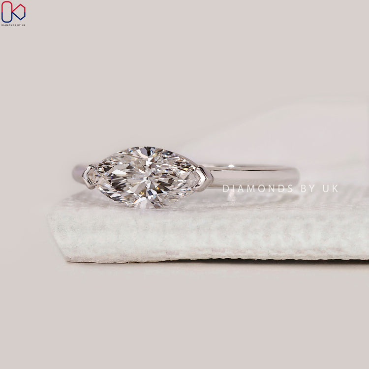 Handmade white gold engagement ring with V prong setting.
