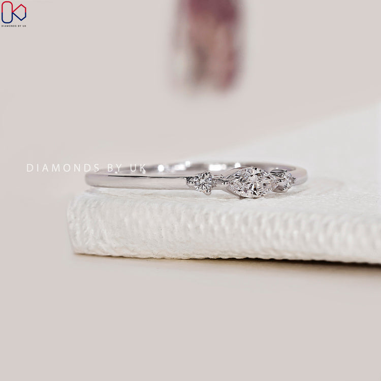 Prong set diamond band with handmade band craftsmanship.
