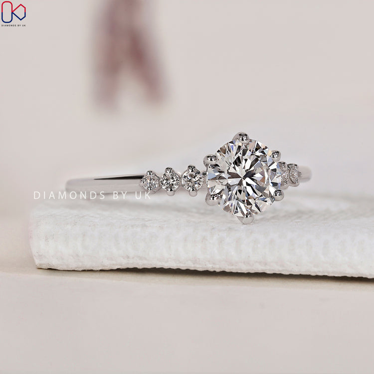 Shop to buy engagement ring featuring a beautiful 7 stone diamond ring.
