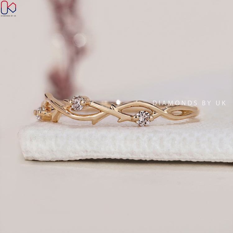 A yellow gold wedding band made with IGI certified lab grown diamonds for ethical beauty.