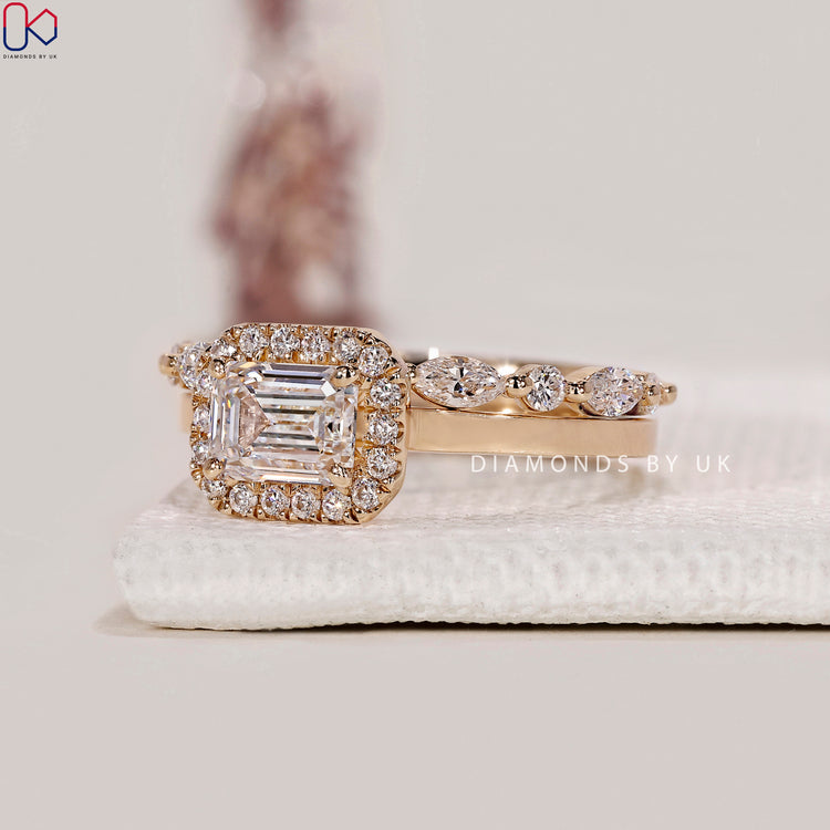 Round cut halo ring with a delicate band design.
