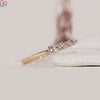 Shared prong set band in yellow gold with lab grown diamonds.
