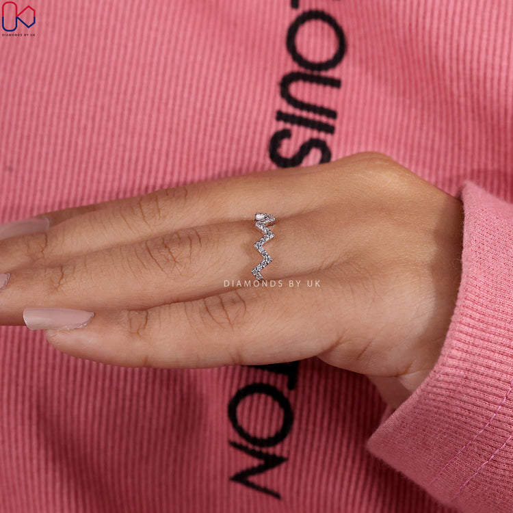 Handmade half eternity wedding band with round cut diamonds.
