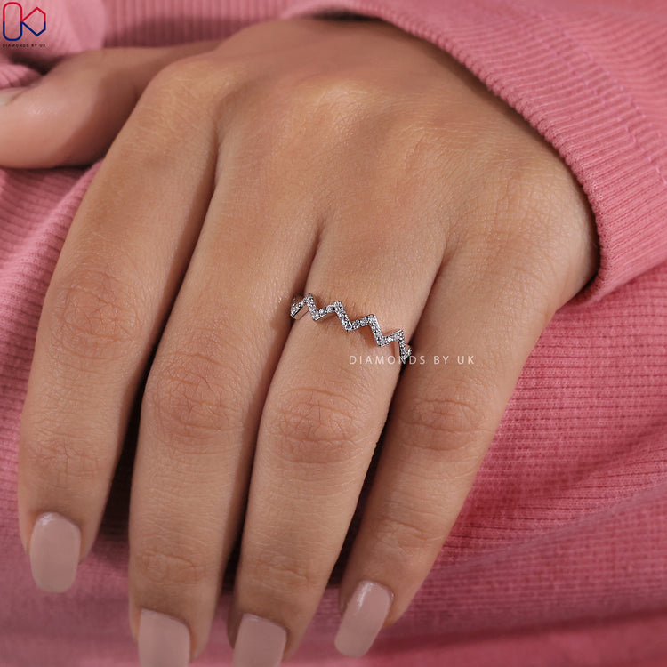 White gold zig zag diamond ring for a modern bridal look.
