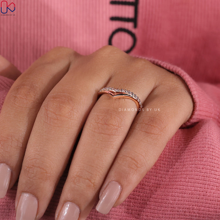 Diamondsbyuk wedding band with prong setting and handmade detail.
