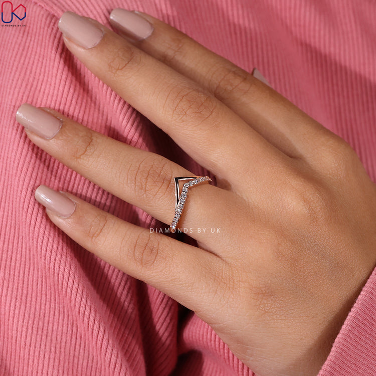 Handmade v shaped band with sparkling lab grown diamonds.
