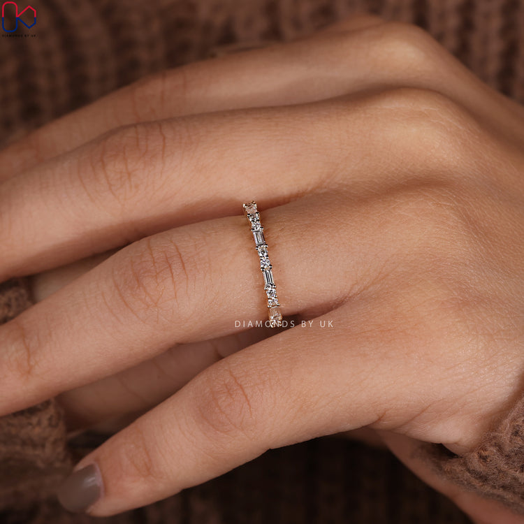 Round diamond and baguette band with a unique combination.
