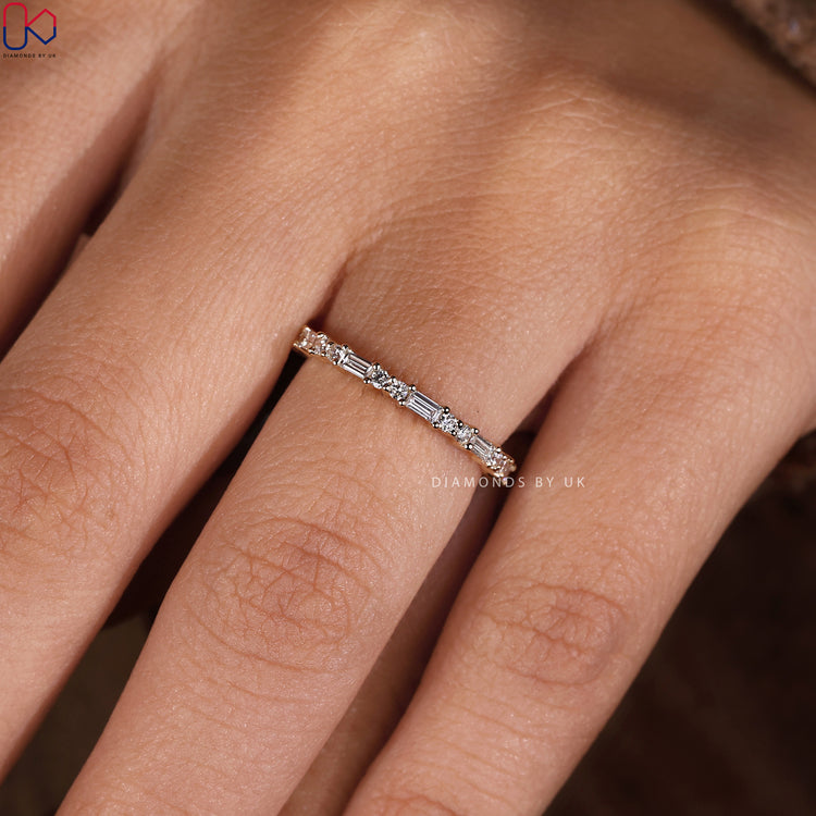 Half eternity band featuring beautiful stone placement.
