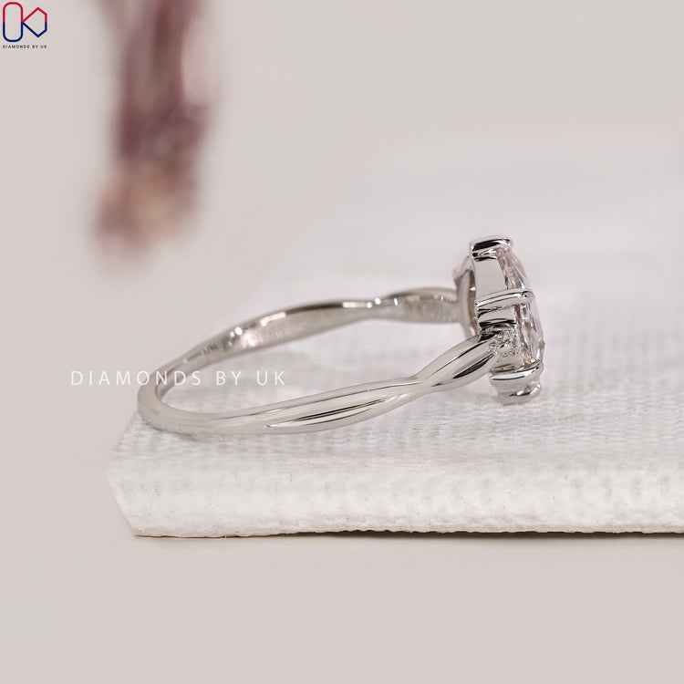 White gold engagement ring with rose cut diamond.
