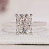 Diamond engagement ring featuring a cushion cut stone in a white gold solitaire setting.