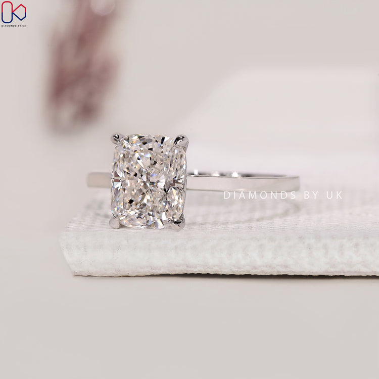 White gold engagement ring crafted with a cushion cut diamond for maximum brilliance.