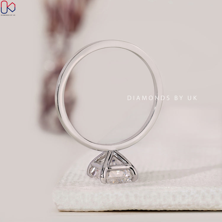 Cushion diamond solitaire ring designed for everyday elegance and secure fit.