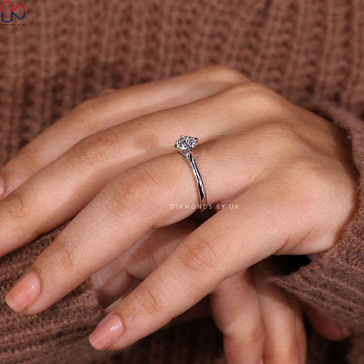 Unique handmade jewellery featuring round brilliant cut diamond.
