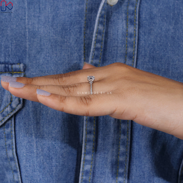 Elegant Asscher ring with round cut pave band.