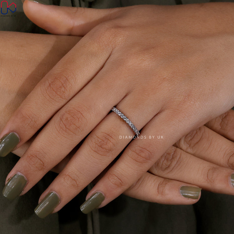 Elegant white gold band by Diamondsbyuk with lab diamonds.
