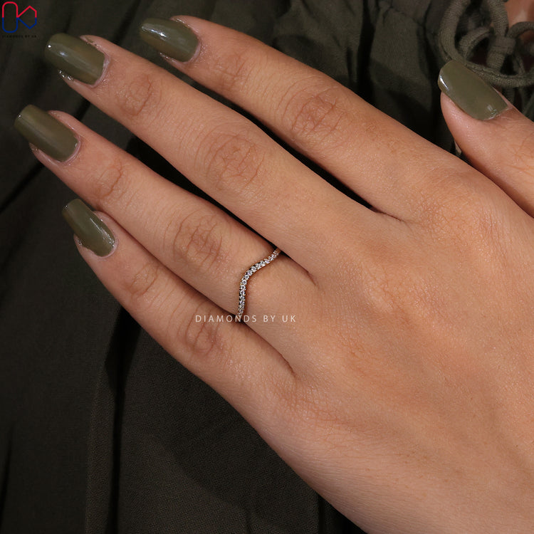 Yellow gold diamond band featuring lab grown diamonds.
