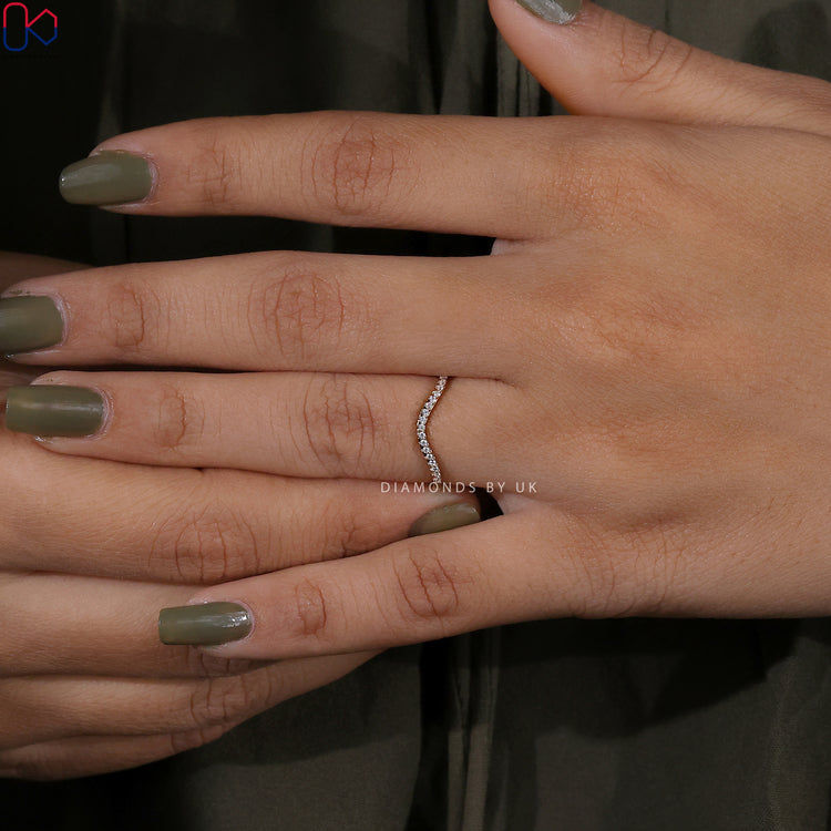 Simple and elegant gold wedding band by Diamondsbyuk.
