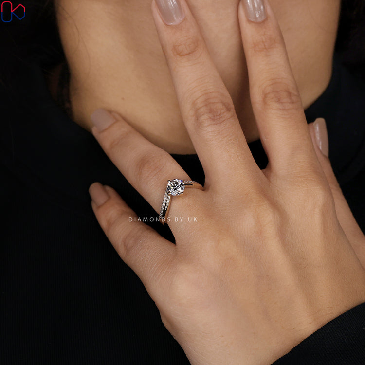 Diamondsbyuk engagement ring with double row band design.
