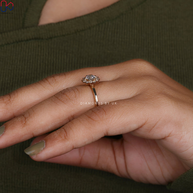 Custom yellow gold halo engagement ring.
